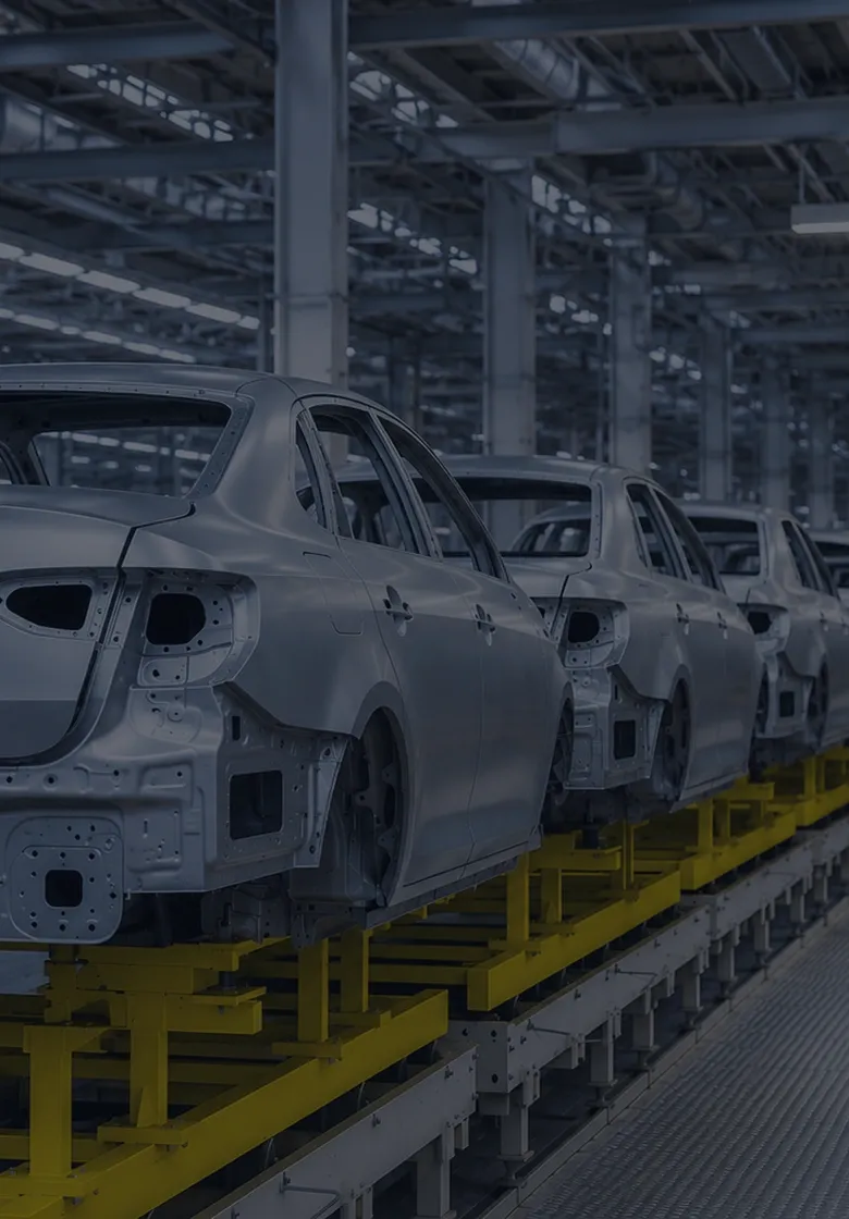 VW automotive production line with engineers on the shop floor