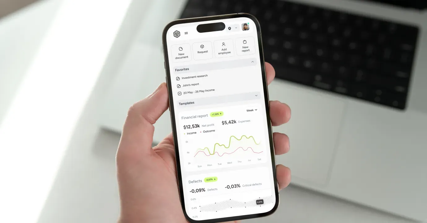 Phone in mans hand screen mockup
